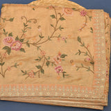 Ethereal Beige Designer Organza Tissue Saree With Gold Embroidered Floral Design