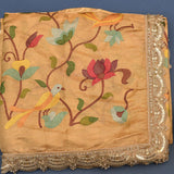 Peach Silk Saree With Embroidered Floral And Bird Design With Gold Border