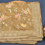 Beige Tissue Saree With Hand-Painted Floral And Bird Design With Gold Border