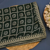 Elegant Forest Green Bandhani Silk Saree With White Tie-Dye Pattern & Gold Embroidered Border
