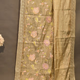 Elegant Beige Organza Tissue Saree With Hand-Embroidered Roses & Gold Border