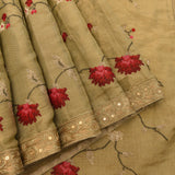 Classic Beige Organza Tissue Saree With Delicate Pink Floral Buttis And Woven Gold Zari Border