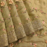 Beige Organza Tissue Saree With Embroidered Birds And Floral Motifs With Gold Border