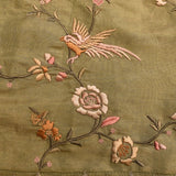 Beige Organza Tissue Saree With Embroidered Birds And Floral Motifs With Gold Border