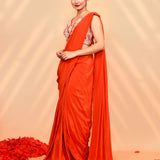 Reddish Orange Crepe Silk Draped Saree