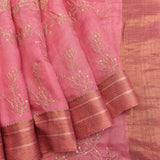 Soft Pastel Pink Sheer Organza Saree With Peach Floral Clusters And Woven Gold Zari Border