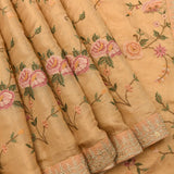 Ethereal Beige Designer Organza Tissue Saree With Gold Embroidered Floral Design