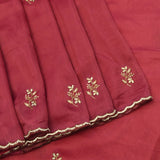 Muted Mauve Georgette Designer Saree With Hand-Embroidered Floral Buttis And Scalloped Border