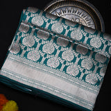 Teal Banarasi Silk Saree With Silver Zari Paisley Jaal And Chevron Pallu