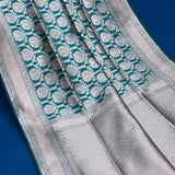 Teal Banarasi Silk Saree With Silver Zari Paisley Jaal And Chevron Pallu