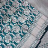 Teal Banarasi Silk Saree With Silver Zari Paisley Jaal And Chevron Pallu