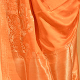 Vibrant Orange Banarasi Silk Saree With Floral Butti And Highlighted Border