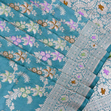 Peacock Teal Banarasi Silk Saree With Silver Zari Floral Vine And Multicolor Pallu