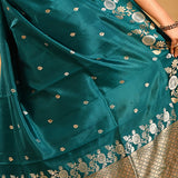 Bottle Green With Gold And Silver Zari Floral Border In Banarasi Silk Saree