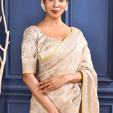 Pastel Golden Embroidered Tissue Saree