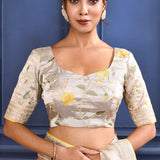 Pastel Golden Embroidered Tissue Saree
