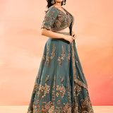 Teal Blue Animal And Floral Embroidered Tissue Lehenga