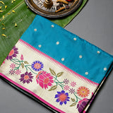 Teal Blue Paithani Silk Saree With Multicolour Lotus & Floral Weave Pallu