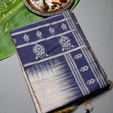 Beige And Navy Blue Ikat Woven Pure Tussar Silk Banarasi Saree With Contrast Border