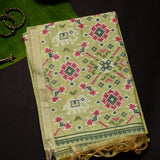 Pastel Pistachio Green Floral Butti Banarasi Silk Saree With Woven Geometric Pallu