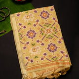Cream Banarasi Linen Saree With Patan Patola Weave Pallu & Multicolour Butti
