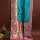 Turquoise Blue Gold Zari Paithani Silk Saree With Floral Pallu