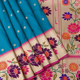 Teal Blue Paithani Silk Saree With Multicolour Lotus & Floral Weave Pallu