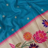 Teal Blue Paithani Silk Saree With Multicolour Lotus & Floral Weave Pallu