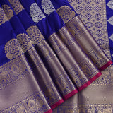 Royal Blue Gold Zari Floral Bouquet Butti Pure Silk Kanjivaram Saree With Contrast Magenta Border And Heavy Gold Pallu