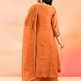 Rust Orange Anarkali Set With Embroidered Neckline And Gota Border Dupatta