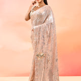 Soft Peach Embroidered Sequin Net Saree With 3D Floral Embroidery Blouse