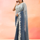 Horizon Blue Metallic Shimmer Net Saree With Floral Embroidery Border
