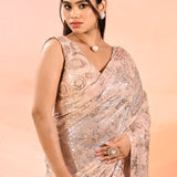 Soft Peach Embroidered Sequin Net Saree With Floral Blouse