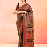 Rust Orange With Artistic Paisley Weave Kani Silk Saree