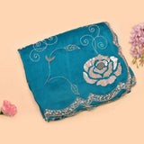 Teal Saree With Pearl Swirl Embroidery And Sequin Rose Motif