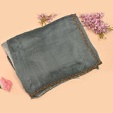 Dusty Blue Organza Saree With Hand Embroidered Floral Booti And Antique Gold Leaf Border