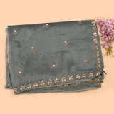 Sage Green Georgette Saree With Hand Embroidered Floral Butti And Scalloped Border