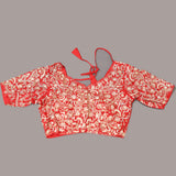 Red-Orange Shaded Organza Saree With Hand Embroidered Lotus Booti And Floral Border