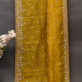 Mustard Yellow Organza Saree With Heavy Hand Embroidered Floral Vine Border And Star Booti