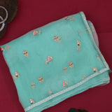 Sea Green Organza Saree With Multicolor Floral Embroidered Butis And Silver Sequin Border