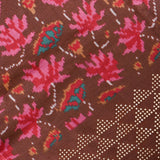 Brown Ikat-Print Saree With Abstract Floral Motifs And Sequin Border