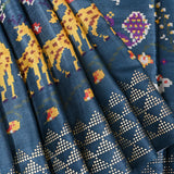 Petrol Blue Ikat-Print Saree With Giraffe Motif And Sequin Border