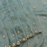 Sage Green Georgette Saree With Hand Embroidered Floral Butti And Scalloped Border