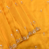 Golden Yellow Georgette Saree With Hand Embroidered Floral Butti And Scalloped Border