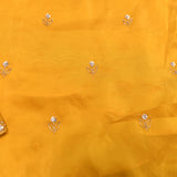 Golden Yellow Georgette Saree With Hand Embroidered Floral Butti And Scalloped Border