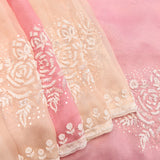 Shaded Peach Pink Georgette Saree With Hand Embroidered White Rose Motifs