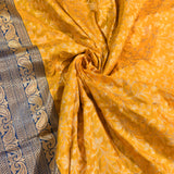 Sunshine Yellow And Royal Blue Silver Zari Floral Jaal Pure Silk Banarasi Saree With Paisley Pallu And Striped Border