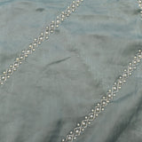 Dusty Blue Hand Embroidered Georgette Saree With Pearl Zari Border