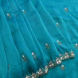 Teal Hand Embroidered Georgette Saree With Floral Sequin Border