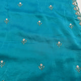 Teal Hand Embroidered Georgette Saree With Floral Sequin Border